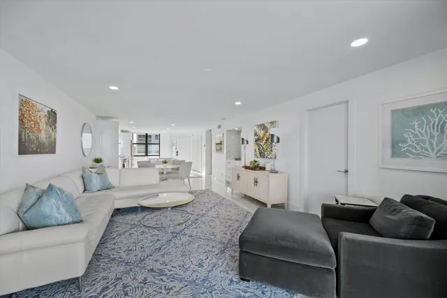 a living room with furniture and a couch