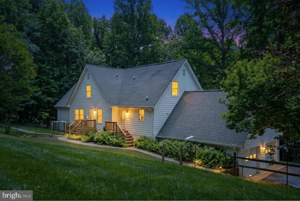 38620 Lime Kiln Road Leesburg, VA 20175 - Photo 8 of 87 a aerial view of a house with a yard and a large tree