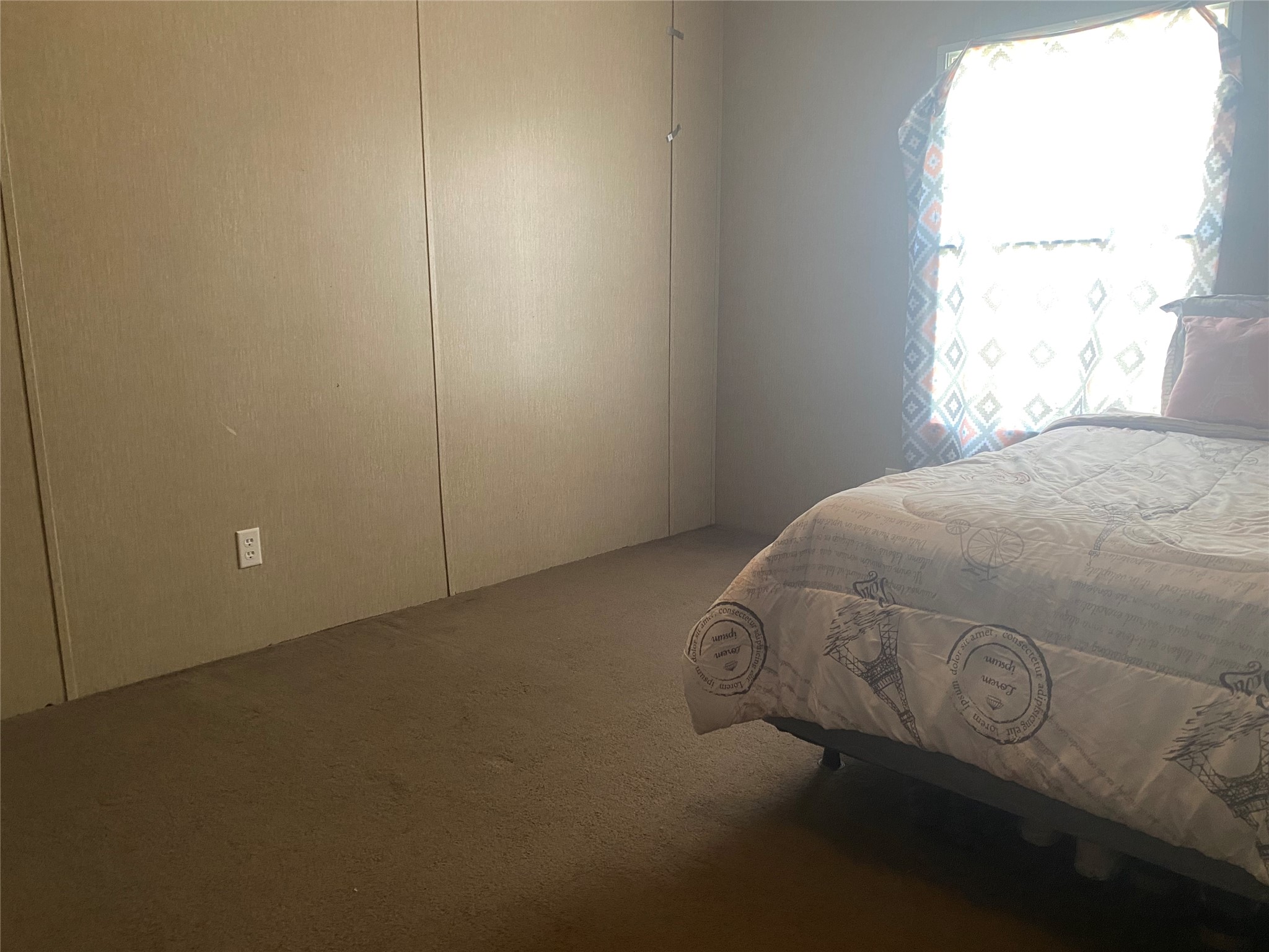 357 Duchess Pass Kyle, TX 78640 - Photo 14 of 18 a bedroom with a bed and a window