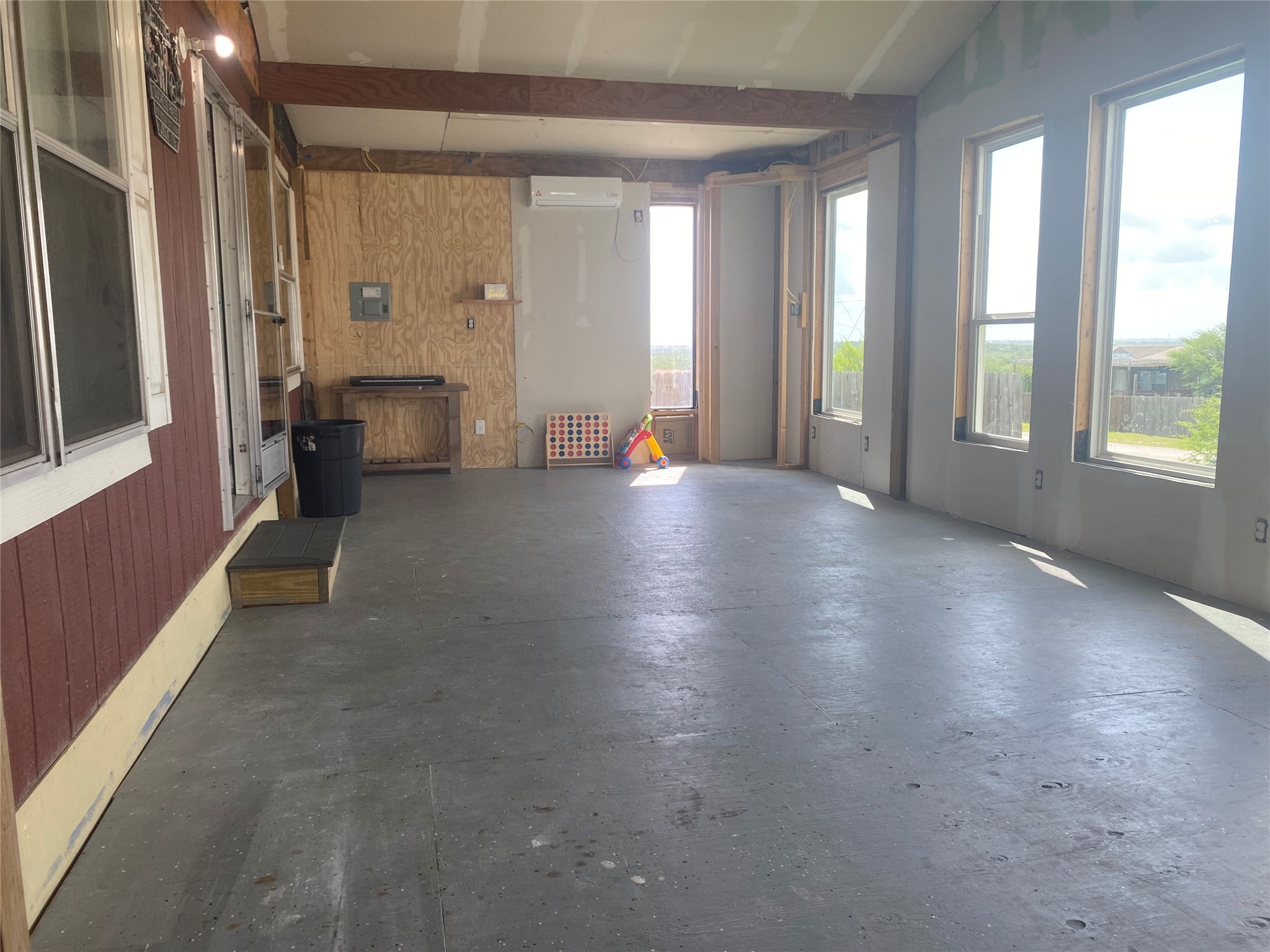 357 Duchess Pass Kyle, TX 78640 - Photo 17 of 18 a view of a livingroom with furniture and windows