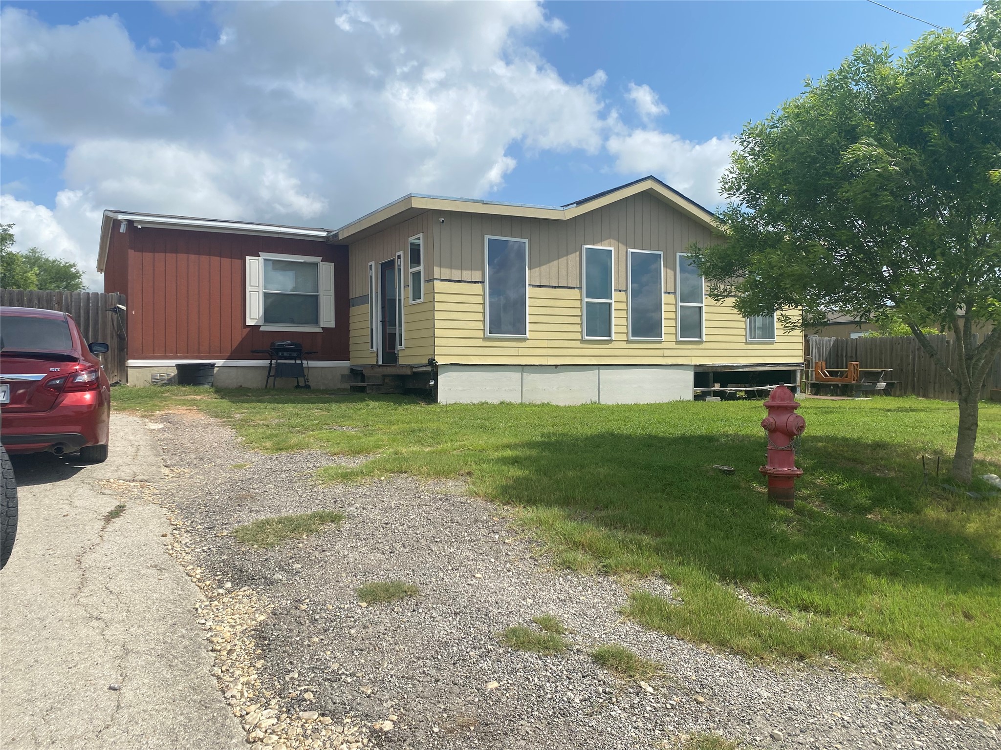 357 Duchess Pass Kyle, TX 78640 - Photo 3 of 18 a house view with a garden space