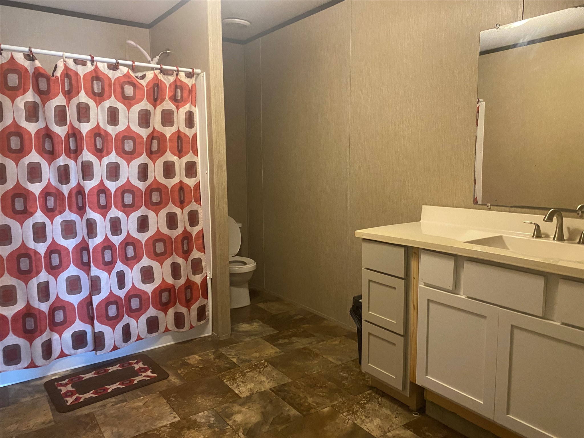 357 Duchess Pass Kyle, TX 78640 - Photo 6 of 18 a bathroom with a sink and a shower