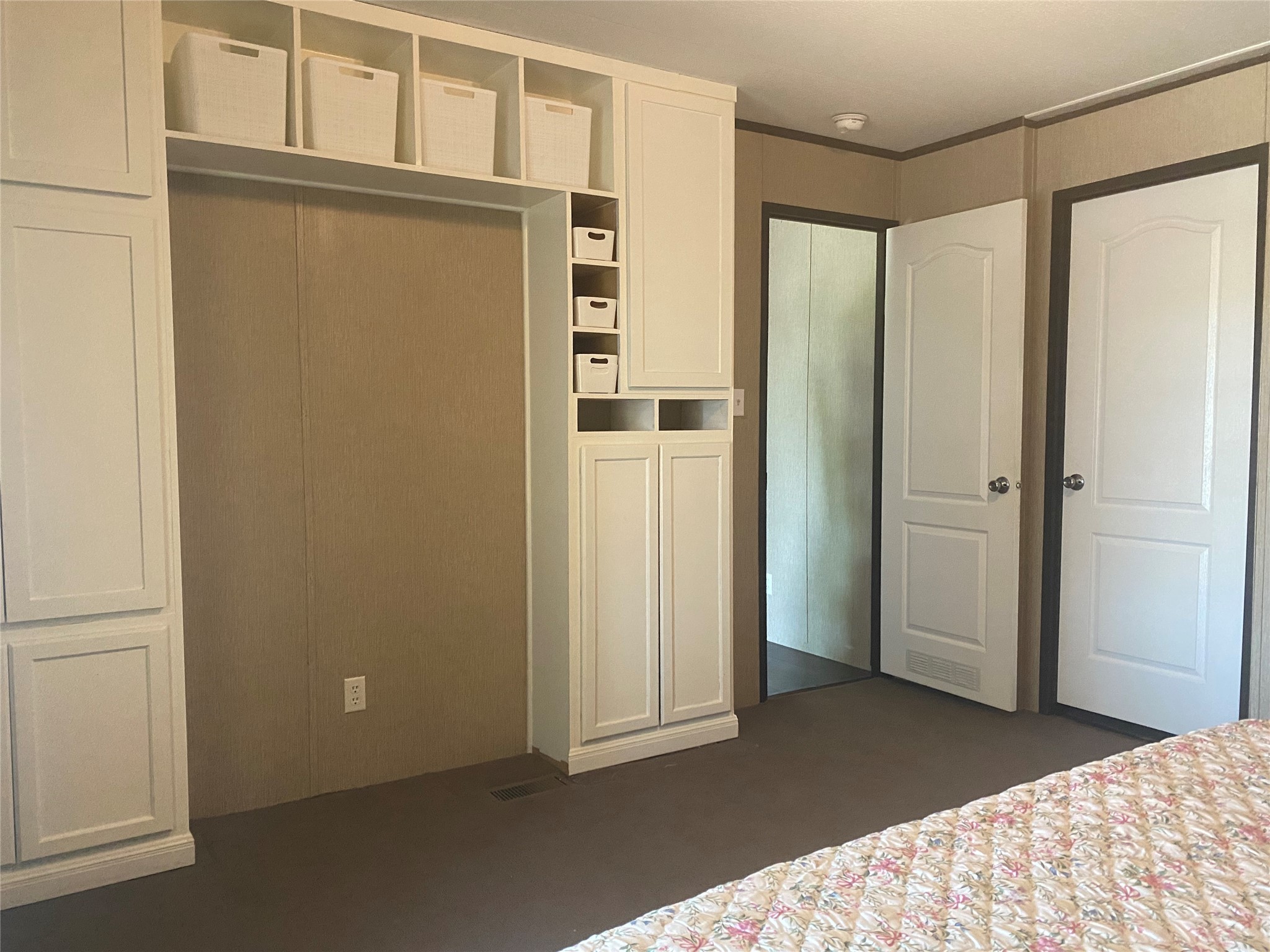 357 Duchess Pass Kyle, TX 78640 - Photo 7 of 18 a bedroom with a bed and a cabinet