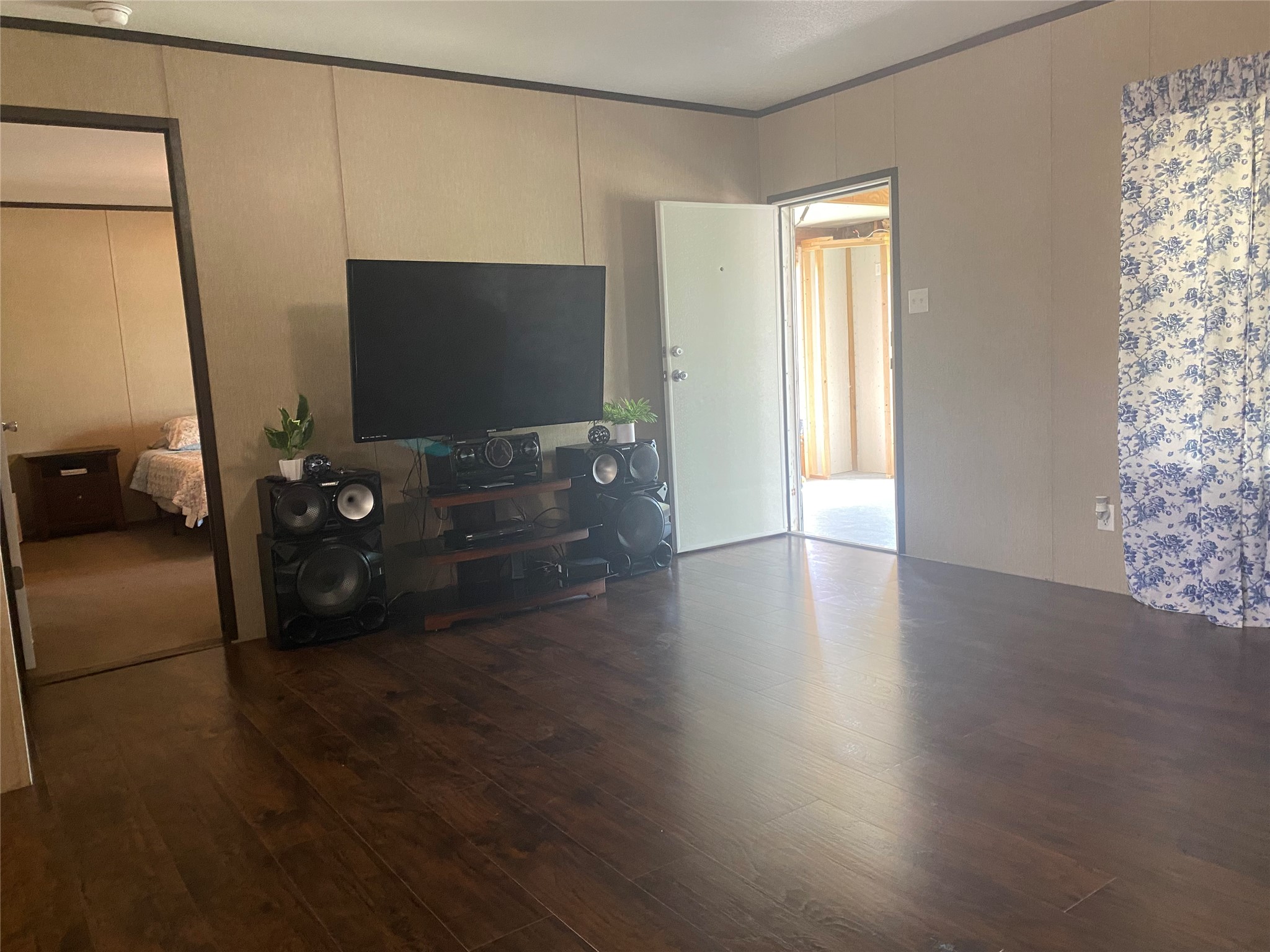 357 Duchess Pass Kyle, TX 78640 - Photo 9 of 18 a living room with furniture and a flat screen tv