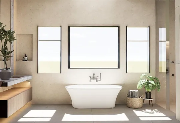 a white bath tub sitting next to a white sink