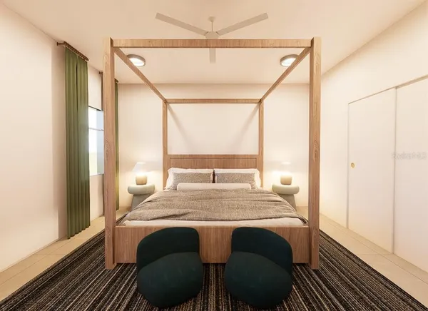 a bed sitting in a bedroom next to a window