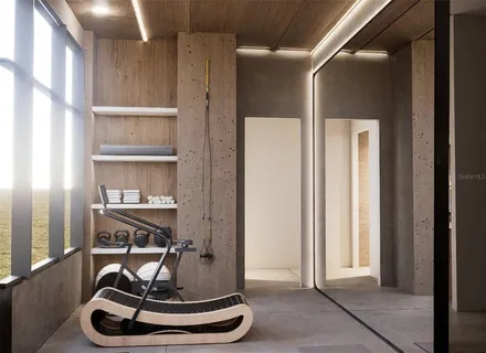 a room with hard wood flooring and shoes