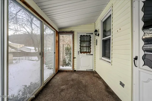 a view of a hallway with closet