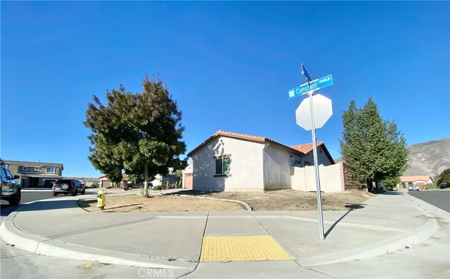 a view of a house with basketball court