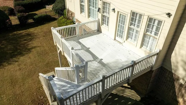 a view of balcony with furniture