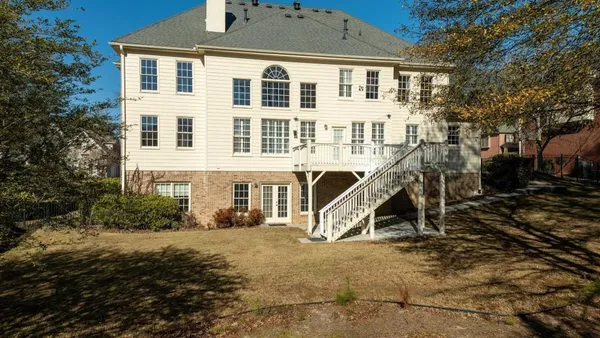 a view of a house with a park