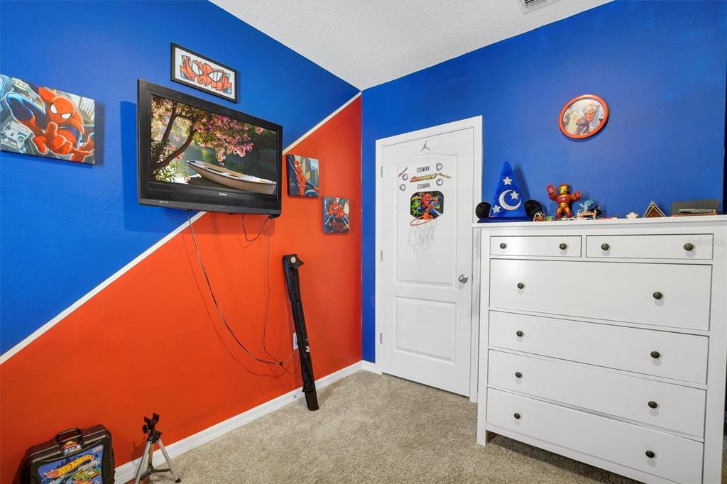 180 Grove Branch Road Winter Haven, FL 33880 - Photo 24 of 49 a view of a livingroom with wooden cabinets