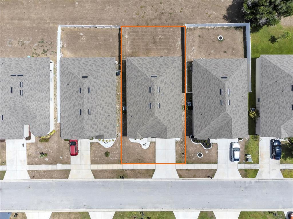 180 Grove Branch Road Winter Haven, FL 33880 - Photo 49 of 49 view of bathroom with a tub shower and mirror