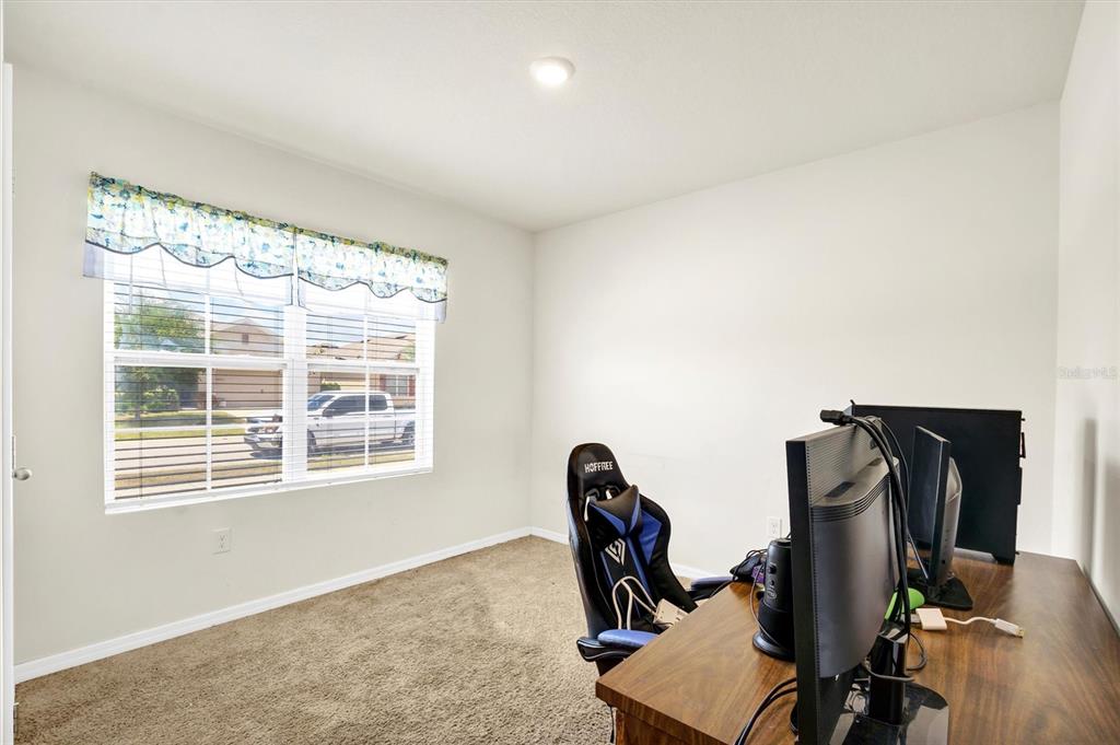 180 Grove Branch Road Winter Haven, FL 33880 - Photo 5 of 49 a view of a room with gym equipment