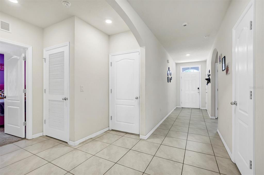 180 Grove Branch Road Winter Haven, FL 33880 - Photo 7 of 49 a view of a hallway to rooms