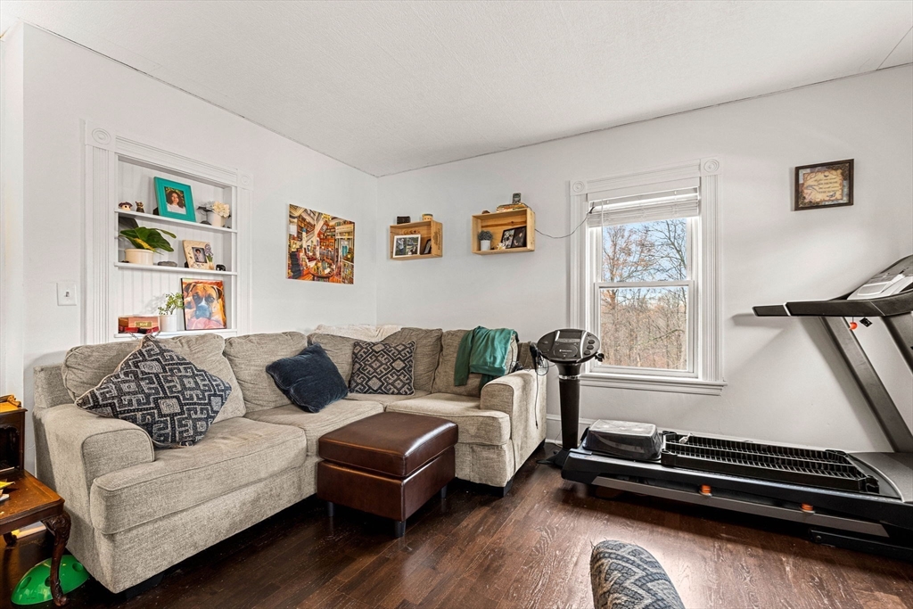 32 Kirby Street Marlborough, MA 01752 - Photo 16 of 39 a living room with furniture and a window