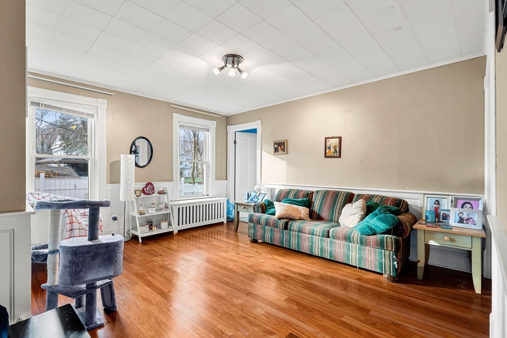 32 Kirby Street Marlborough, MA 01752 - Photo 23 of 39 a living room with furniture and a wooden floor