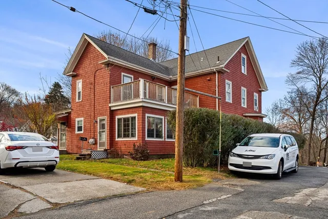 a car parked in front of a house