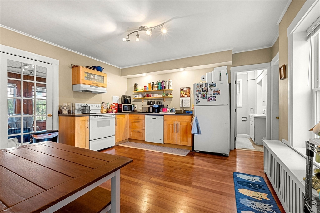 32 Kirby Street Marlborough, MA 01752 - Photo 7 of 39 a living room with stainless steel appliances kitchen island granite countertop furniture and a kitchen view