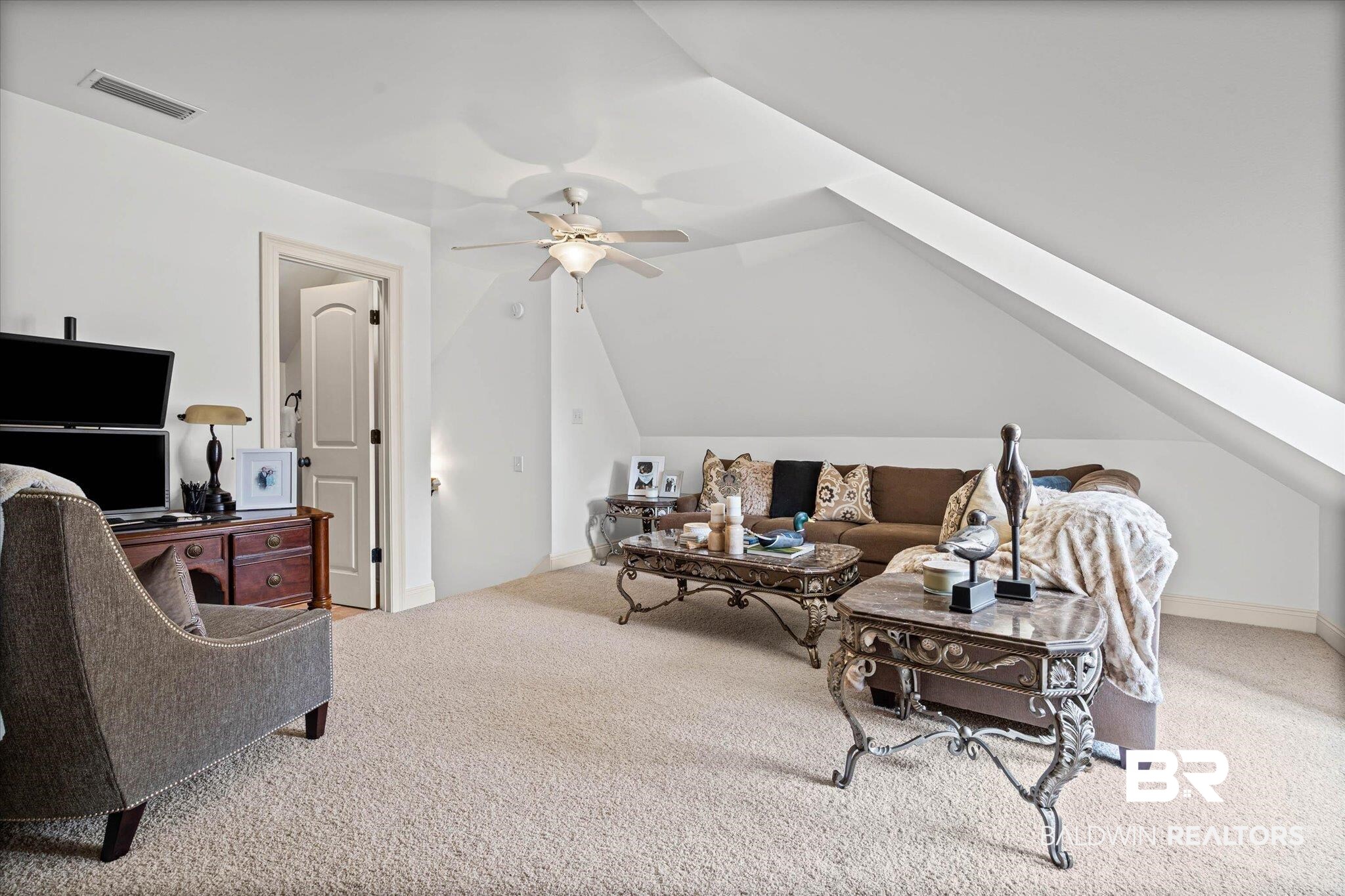 3459 Rue Royal Mobile, AL 36693 - Photo 26 of 31 Carpeted room featuring sloped ceilings, white walls, and a ceiling fan