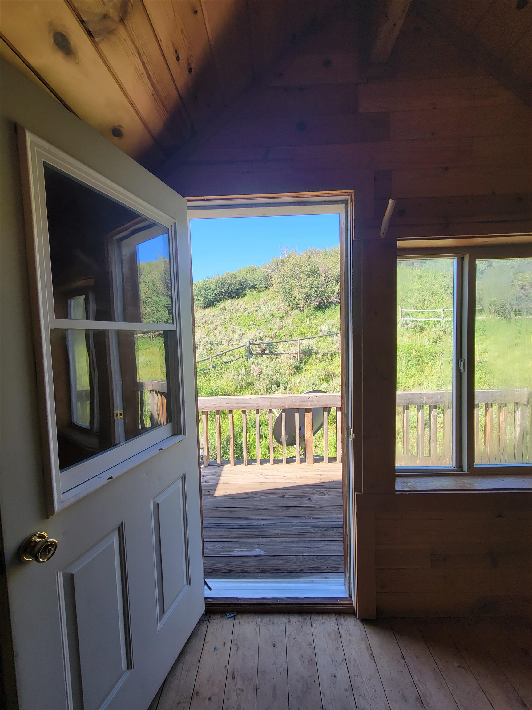 69855 E Highway Collbran, CO 81624 - Photo 20 of 41 a view of a porch with wooden floor and outdoor space