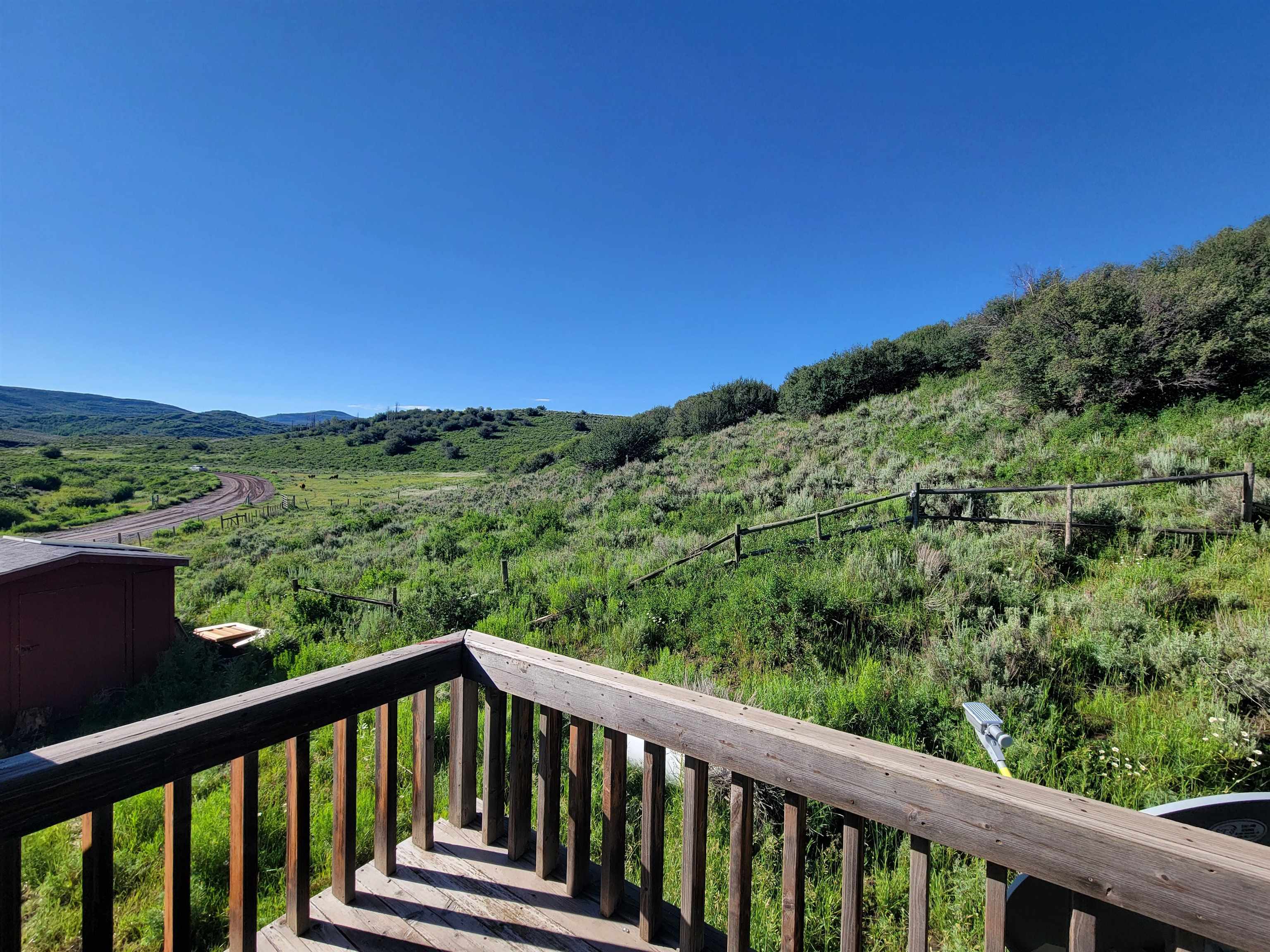 69855 E Highway Collbran, CO 81624 - Photo 22 of 41 a balcony with an outdoor space
