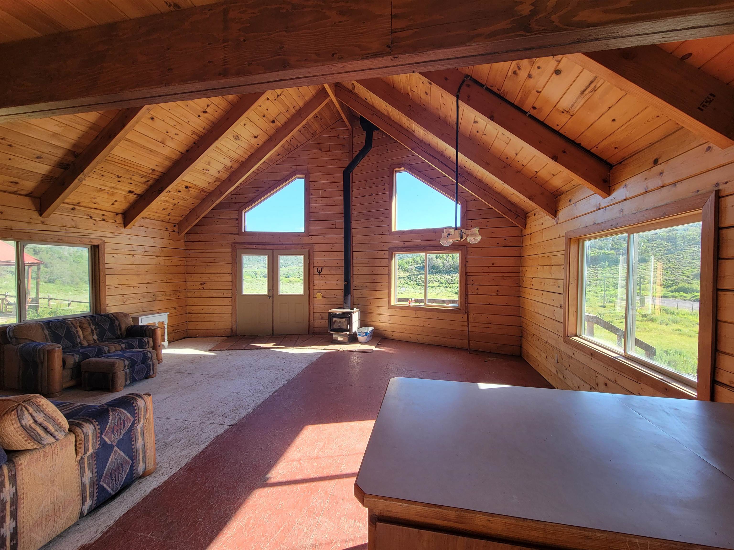 69855 E Highway Collbran, CO 81624 - Photo 29 of 41 a living room with furniture and windows