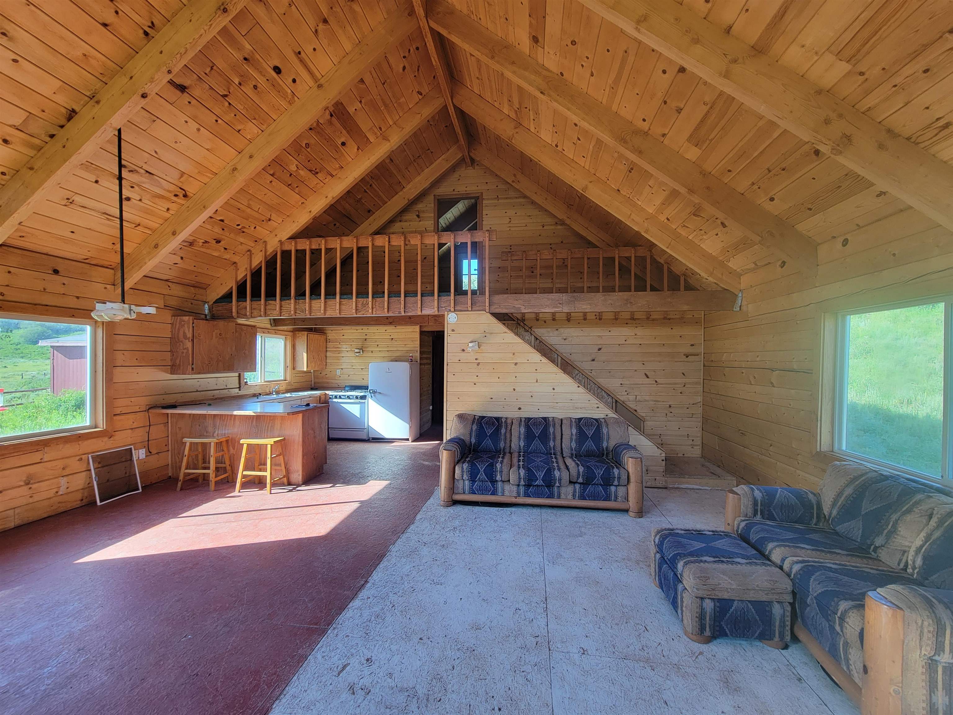 69855 E Highway Collbran, CO 81624 - Photo 35 of 41 a living room with furniture a fireplace and a table