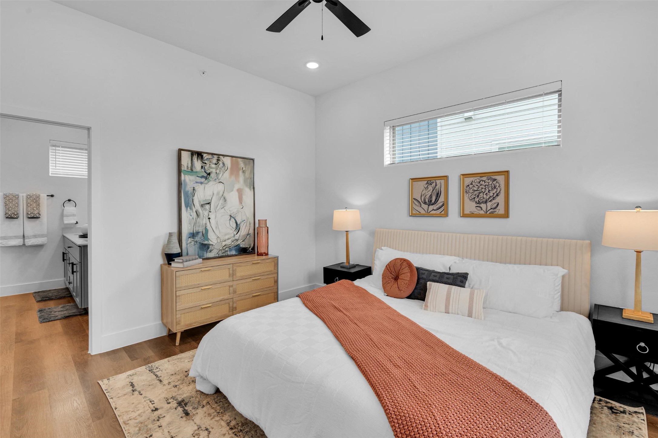 1833-911 Labrador Lane Garland, TX 75040 - Photo 14 of 41 a bedroom with a bed and wooden floor