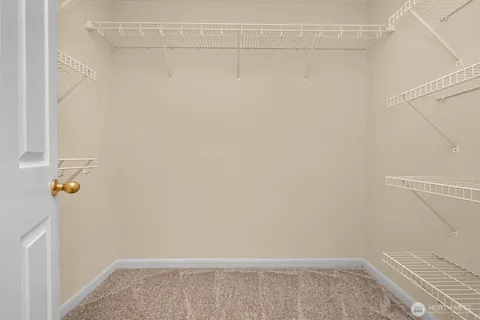 a view of small space with racks on the wall