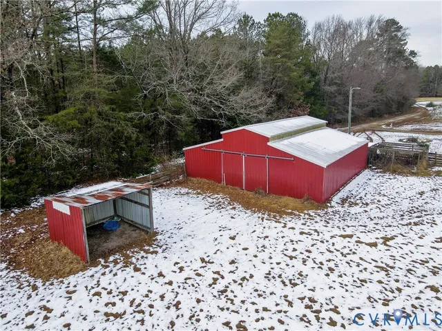a view of a backyard with a trampoline