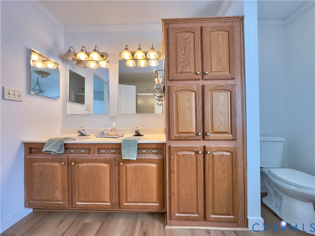 275 Reams Road Petersburg, VA 23805 - Photo 44 of 50 a view of a kitchen with cabinets and wooden floor