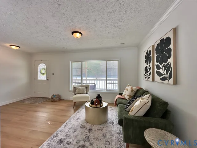 a kitchen with a sink a counter space cabinets and appliances