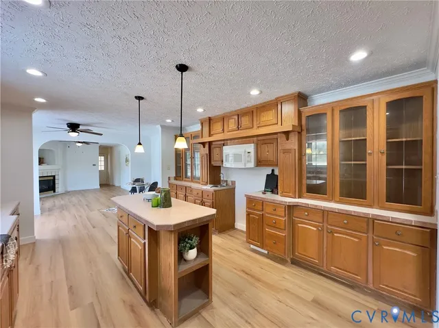 a kitchen with stainless steel appliances a refrigerator and a sink
