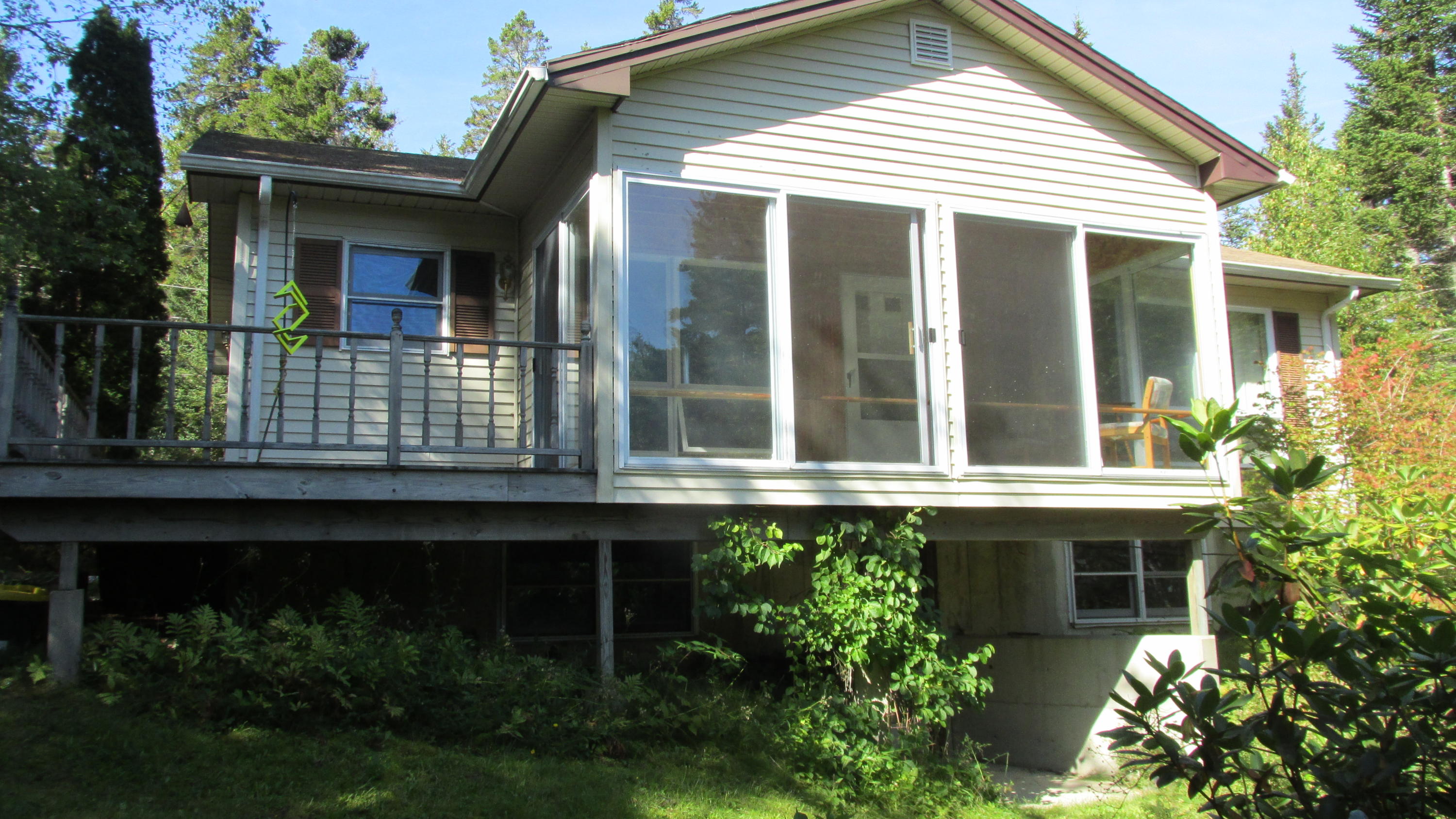 58 Daddy Johnny Road Tremont, ME 04674 - Photo 8 of 52 Exterior back facing pond