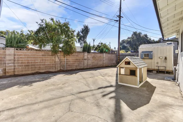 a view of a white house with a sink
