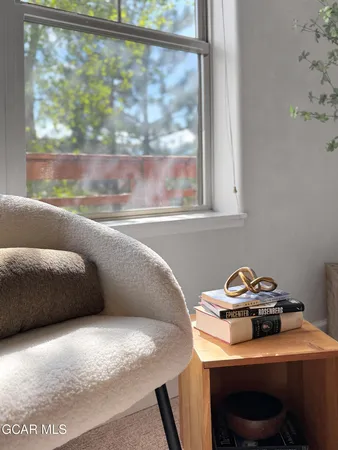a kitchen view living room with a couch