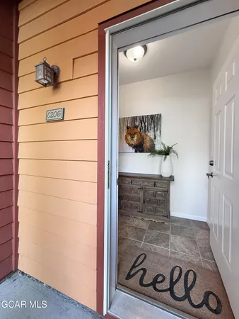 a bathroom with a shower and a sink