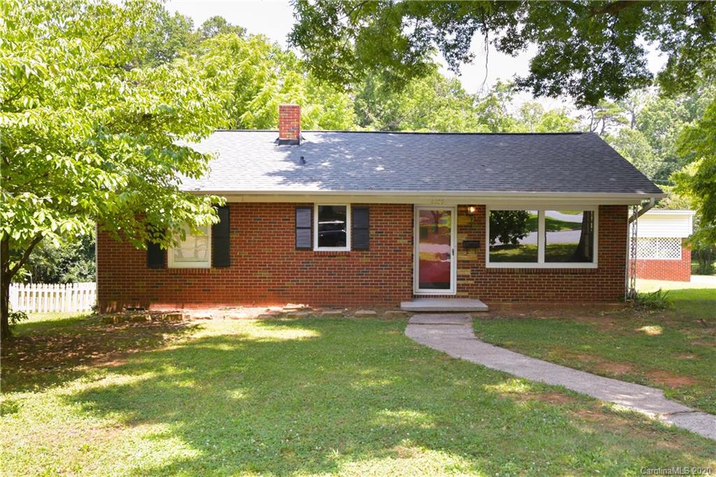 2255 Falmouth Road Charlotte, NC 28205 - Photo 2 of 28 a house view with a garden space