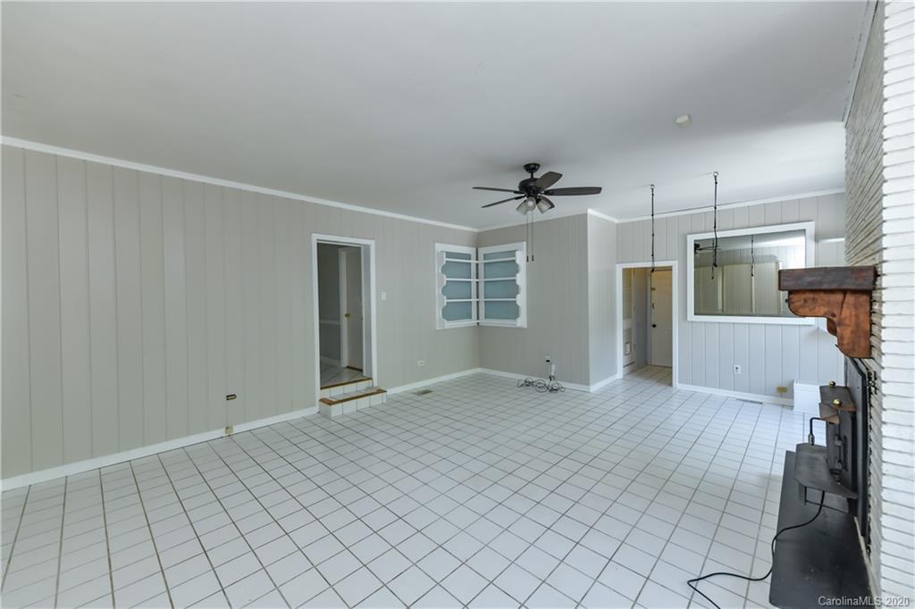 2255 Falmouth Road Charlotte, NC 28205 - Photo 17 of 28 a view of a livingroom with a fireplace