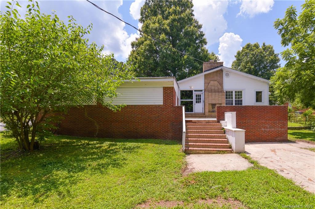 2255 Falmouth Road Charlotte, NC 28205 - Photo 23 of 28 a view of a house with a yard