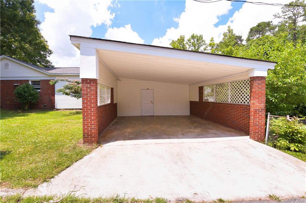 2255 Falmouth Road Charlotte, NC 28205 - Photo 27 of 28 a view of backyard of house garage with green space