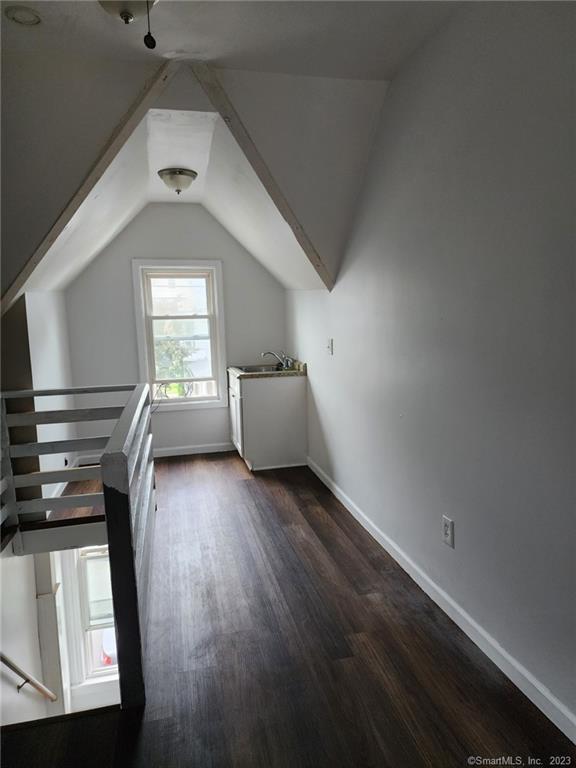 53 Cliff Street Shelton, CT 06484 - Photo 13 of 13 a view of hallway with stairs and wooden floor