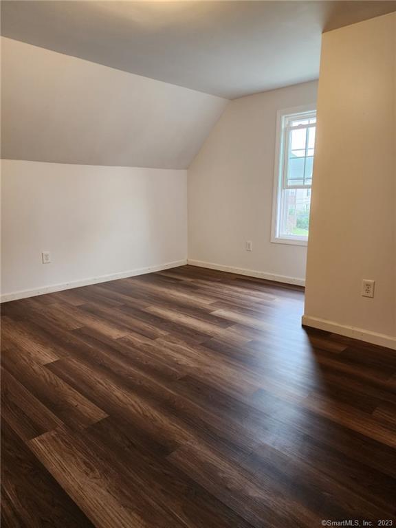 53 Cliff Street Shelton, CT 06484 - Photo 10 of 13 a view of empty room with wooden floor and fan