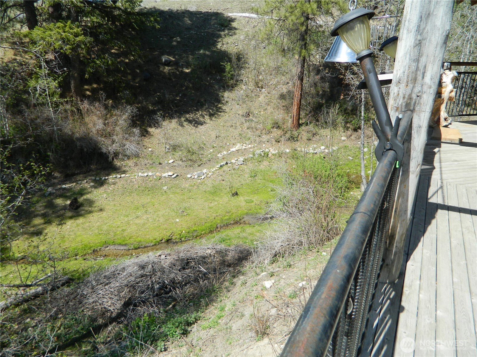 0 High Country Drive West Tonasket, WA 98855 - Photo 11 of 37 a view of a yard with wooden fence