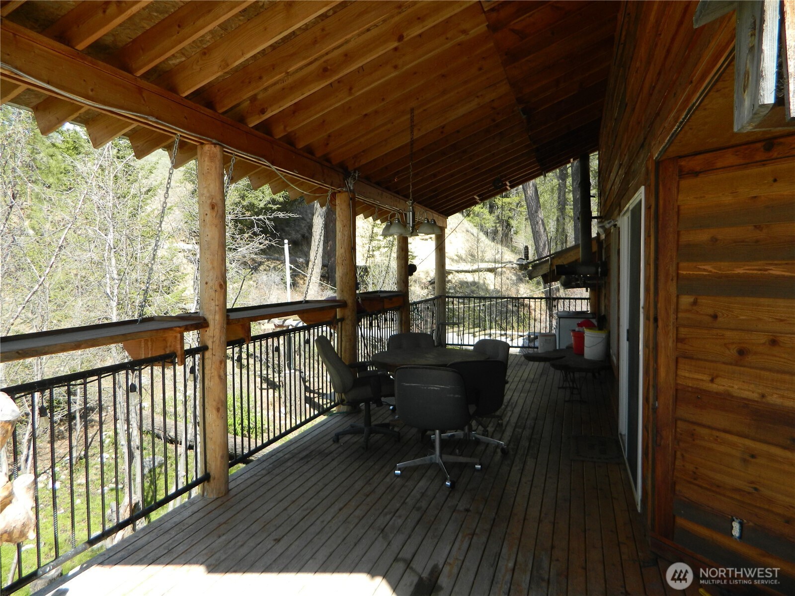 0 High Country Drive West Tonasket, WA 98855 - Photo 13 of 37 a view of balcony with chairs and wooden fence