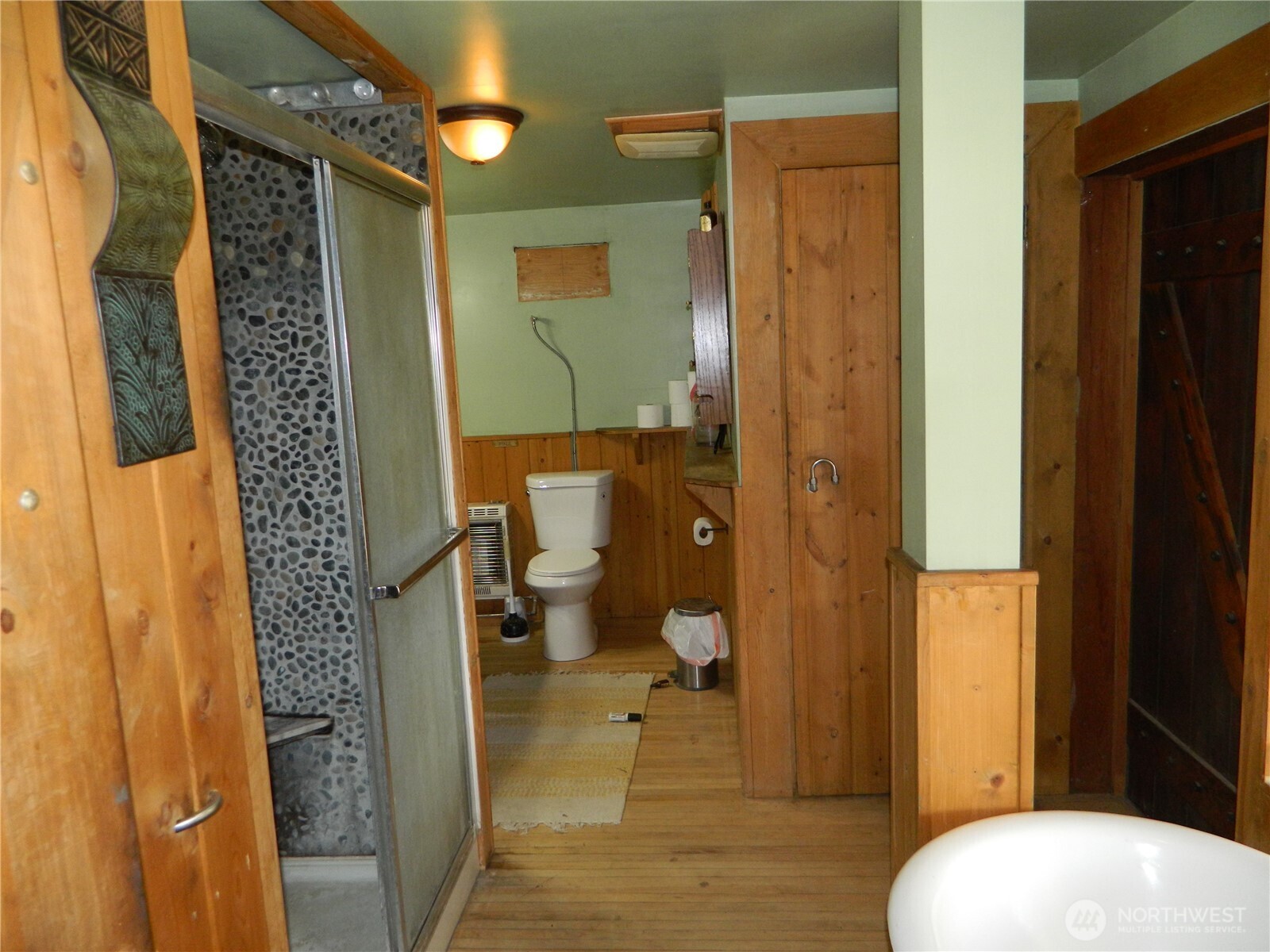 0 High Country Drive West Tonasket, WA 98855 - Photo 24 of 37 a bathroom with a toilet a sink and mirror