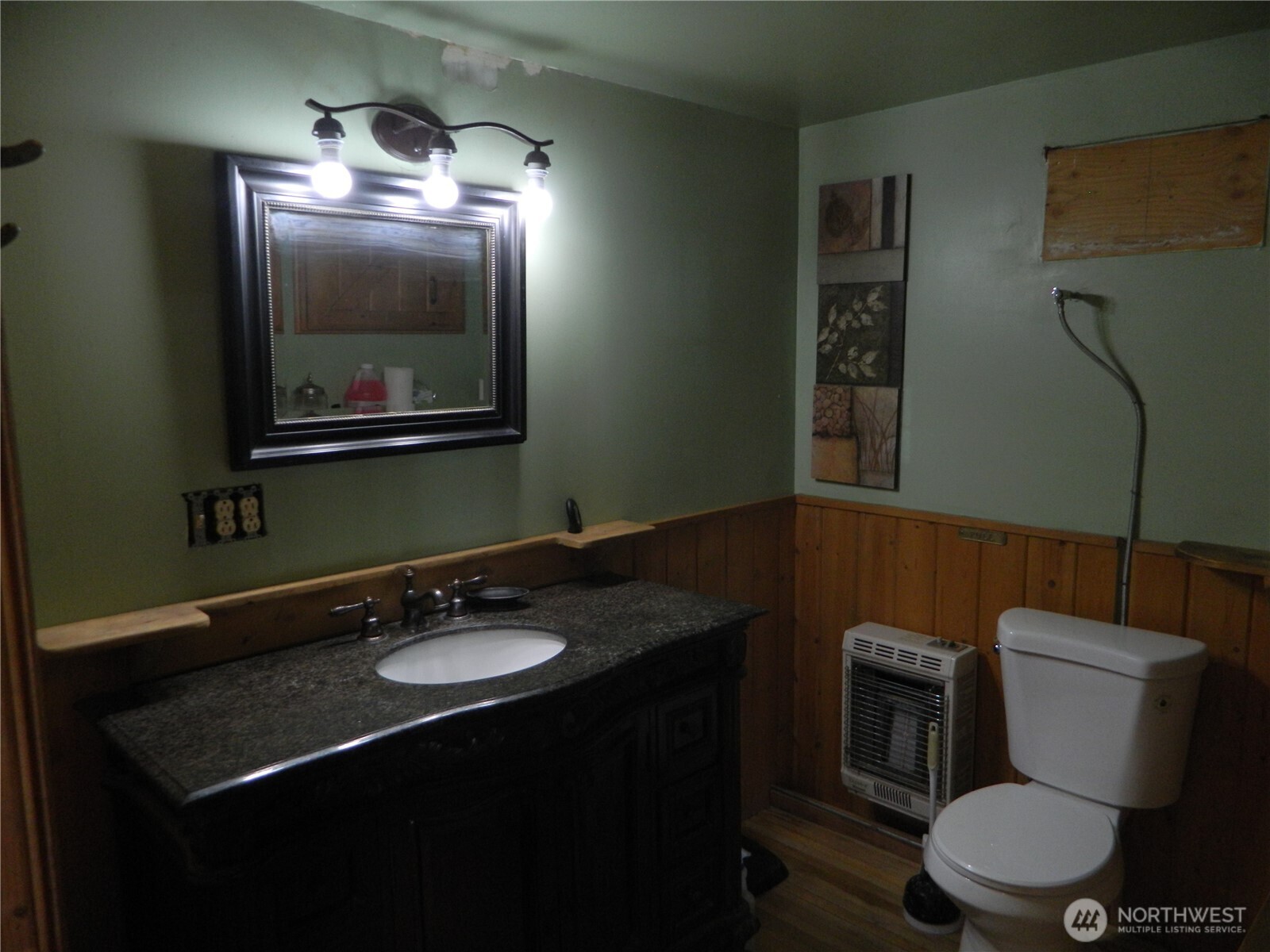 0 High Country Drive West Tonasket, WA 98855 - Photo 26 of 37 a bathroom with a toilet sink and mirror