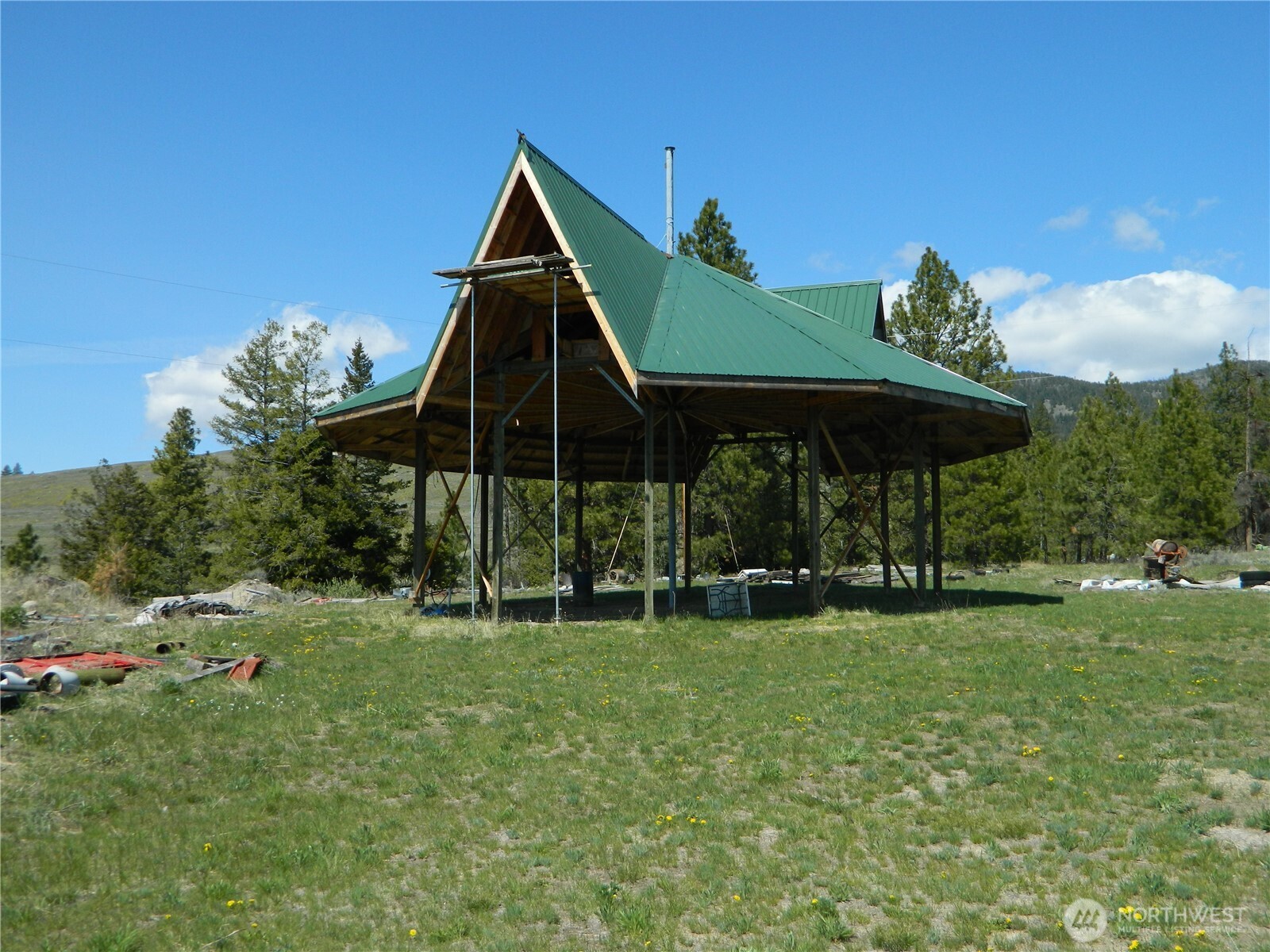 0 High Country Drive West Tonasket, WA 98855 - Photo 28 of 37 a view of a chair and table in the garden