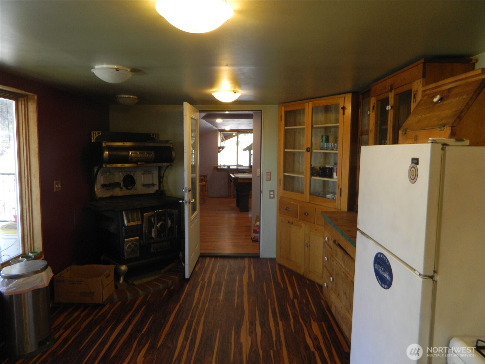 0 High Country Drive West Tonasket, WA 98855 - Photo 10 of 37 a kitchen with a refrigerator and wooden floor